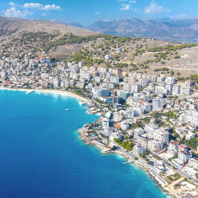 Aerial View Of Saranda A City On The Albanian Riviera Facing The Turquoise Colored Adriatic Mediterranean Sea Albania Balkan Peninsula South Eastern Europe.jpg